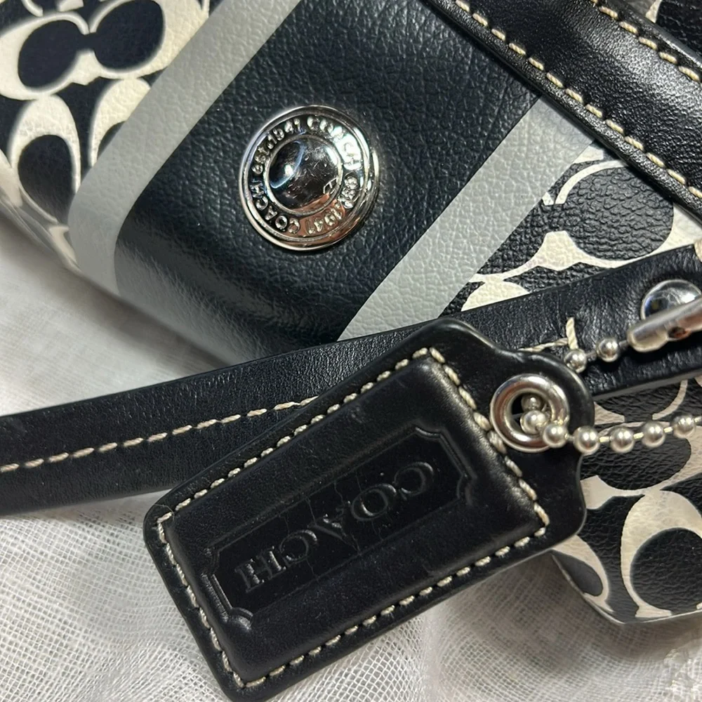 Coach boston leather travel bag with a tag